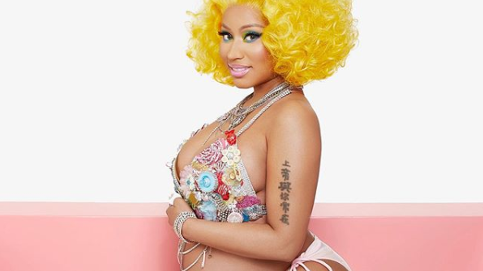Nicki Minaj is pregnant with her first child. See baby bump photos 