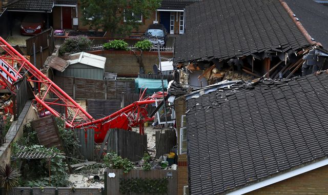 Bow crane collapse: Woman dies after crane falls on houses in east London