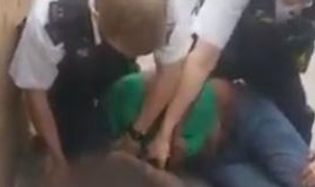 Metropolitan Police officer suspended after 'get off my neck' arrest