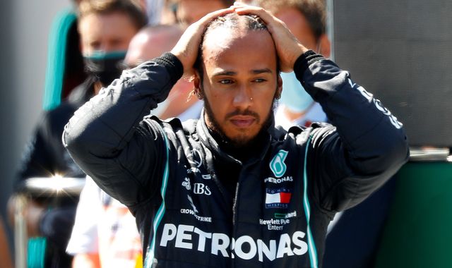 Lewis Hamilton warns 'silence is complicit' in racism as Formula One drivers split over taking knee