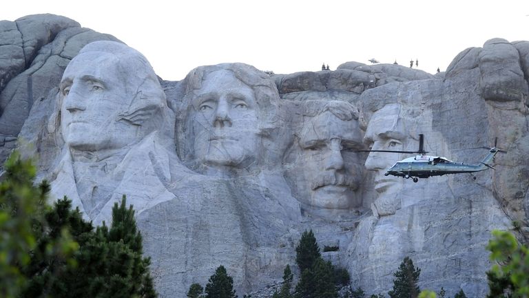 US President Donald Trump and First Lady Melania Trump aboard Marine One arrive to attend Independence Day events at Mount Rushmore in Keystone, South Dakota, July 3, 2020. (Photo by SAUL LOEB / AFP) (Photo by SAUL LOEB/AFP via Getty Images)