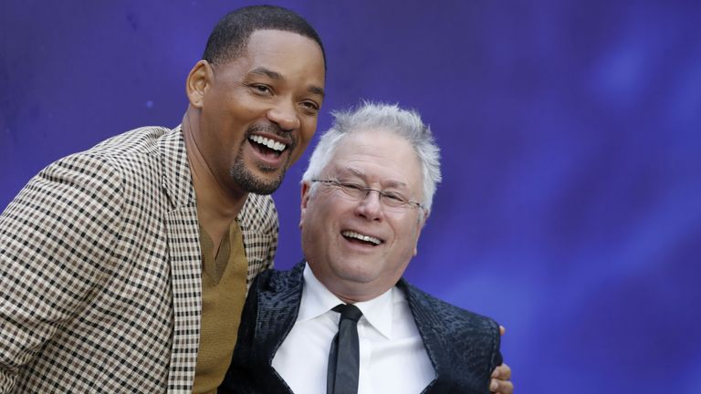 US actor Will Smith (L) and US composer Alan Menken pose on arrival for the European Gala of Aladdin in central London on May 9, 2019. (Photo by Tolga AKMEN / AFP)        (Photo credit should read TOLGA AKMEN/AFP via Getty Images)