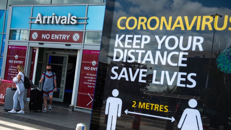 Passengers flying from Barcelona arrive at Birmingham Airport, following an announcement on Saturday that holidaymakers who had not returned from Spain and its islands by midnight would be forced to quarantine for 14 days after Covid-19 second wave fears saw the European country struck off the UK's safe list. The decision was made after Spain recorded more than 900 fresh daily Covid-19 cases for two days running.