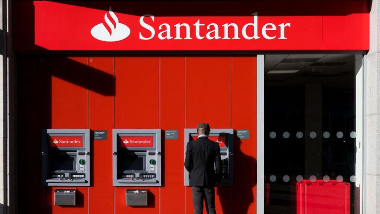 CARDIFF, UNITED KINGDOM - OCTOBER 28: A man uses a Santander cashpoint on October 28, 2018 in Cardiff, United Kingdom. (Photo by Matthew Horwood/Getty Images)
