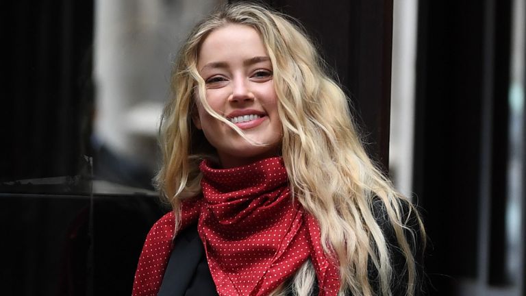 US actress Amber Heard arrives on day eight of the libel trial by her former husband US actor Johnny Depp against News Group Newspapers (NGN), at the High Court in London, on July 16, 2020. - Depp is suing the publishers of The Sun and the author of the article for the claims that called him a "wife-beater" in April 2018. (Photo by DANIEL LEAL-OLIVAS / AFP) (Photo by DANIEL LEAL-OLIVAS/AFP via Getty Images)