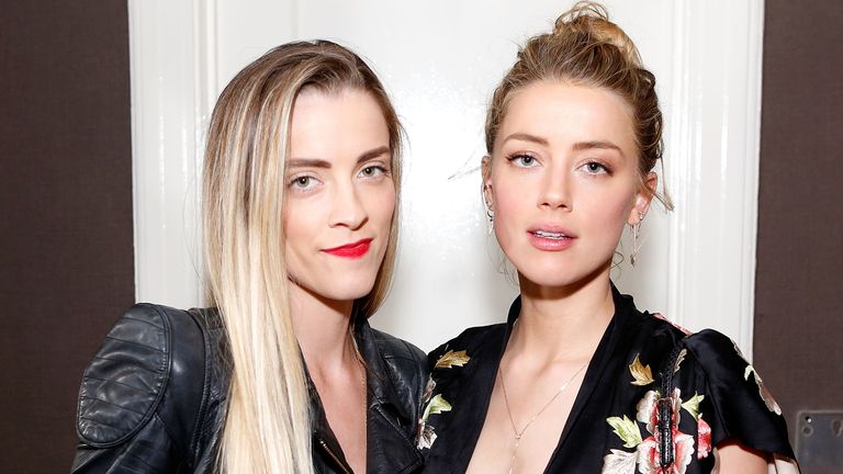 Whitney Heard (L) and Amber Heard attend the Art of Elysium presents Tom Franco at the art salon on May 7, 2016 in Los Angeles, California
