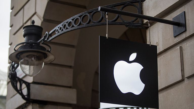 LONDON, ENGLAND - SEPTEMBER 29: The Apple logo sits on a sign outside company&#39;s Covent Garden store on September 29, 2016 in London, England. Technology company Apple has announced that Battersea Power Station, a Grade II listed building and former coal-fired power station, is to be its new London headquarters by 2021. The building, which has been unoccupied for decades, is currently undergoing a £9 billion restoration. (Photo by Jack Taylor/Getty Images) 