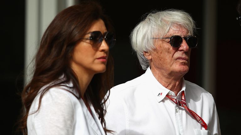 Bernie Ecclestone, Chairman Emeritus of the Formula One Group, looks on in the Paddock with wife Fabiana before the Bahrain Formula One Grand Prix at Bahrain International Circuit on April 8, 2018 in Bahrain