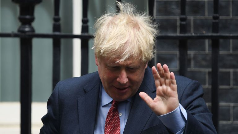Boris Johnson leaves 10 Downing Street ahead of the weekly PMQs session