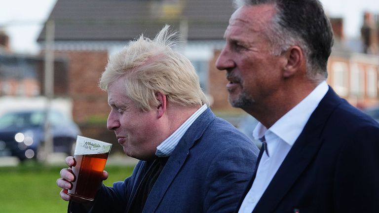 Sir Ian Botham, inset, appeared alongside Boris Johnson, also pictured, before the EU referendum 