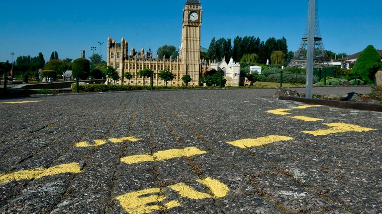 Ground markings are seen at the mock border of the United Kingdom and the European Union during the reopening of the &#39;Mini-Europe&#39; theme park of small-scale models of European capitals and their landmarks, in Brussels on May 20, 2020