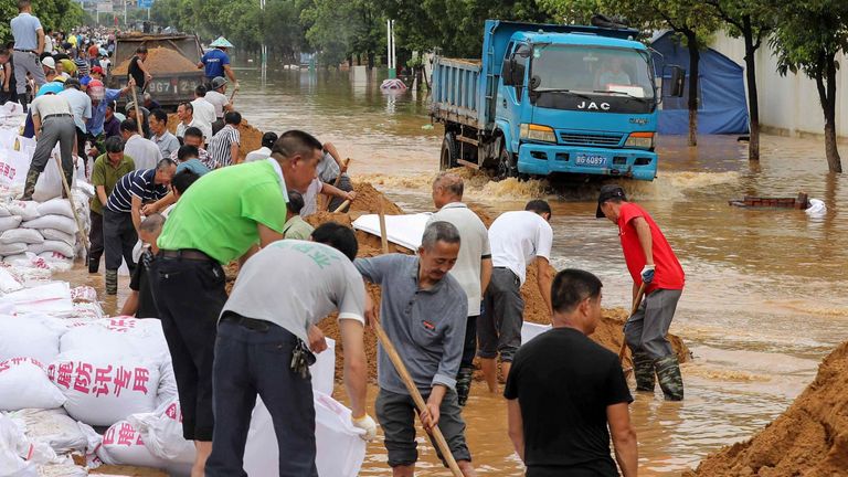 Residents have been putting up makeshift flood defences