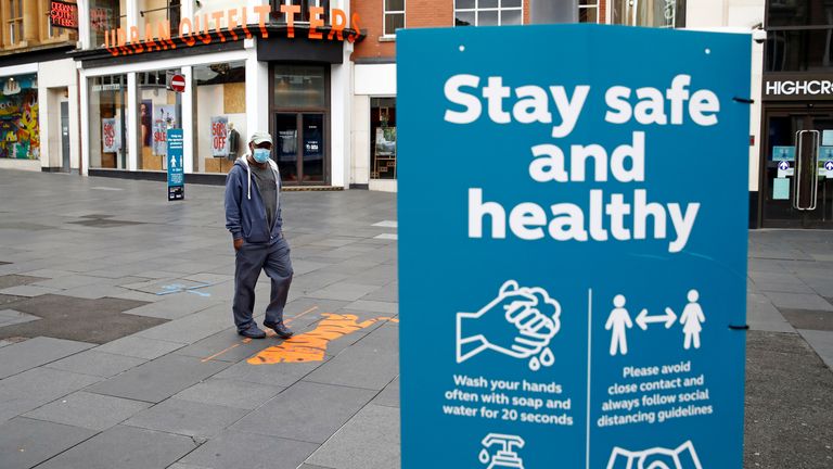 A sign is pictured at an almost empty street, following a local lockdown imposed amid the coronavirus disease (COVID-19) outbreak, in Leicester, Britain, July 4, 2020. REUTERS/Jason Cairnduff