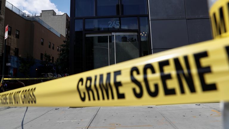 NYPD crime scene tape blocks the entrance to 265 Houston Street, where Fahim Saleh, Co-founder/CEO of Gokada, was found dead at the apartment building in New York City, New York, U.S., July 15, 2020. REUTERS/Shannon Stapleton