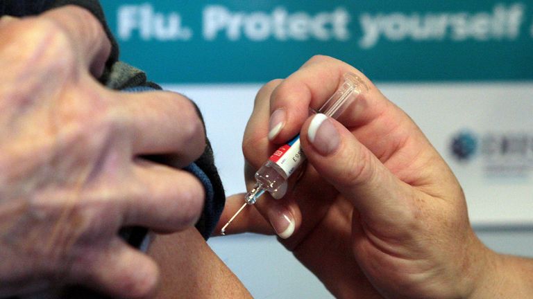 A patient receives the seasonal flu vaccine as Scottish Health Secretary Nicola Sturgeon launches the flu jab campaign at Davidson&#39;s Mains Medical Centre in Edinburgh