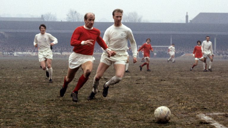 The Charlton brothers - Bobby (L) and Jack - in action for their rival clubs Manchester United and Leeds United in January 1969