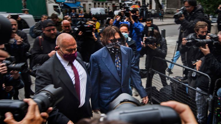 Actor Johnny Depp arriving at the High Court in London for a hearing in his libel case against the publishers of The Sun and its executive editor, Dan Wootton. PA Photo. Picture date: Thursday July 9, 2020. 57-year-old Depp is suing the tabloid&#39;s publisher News Group Newspapers (NGN) over an article which called him a "wife beater" and referred to "overwhelming evidence" he attacked Ms Heard, 34, during their relationship, which he strenuously denies. See PA story COURTS Depp. Photo credit should read: Victoria Jones/PA Wire 