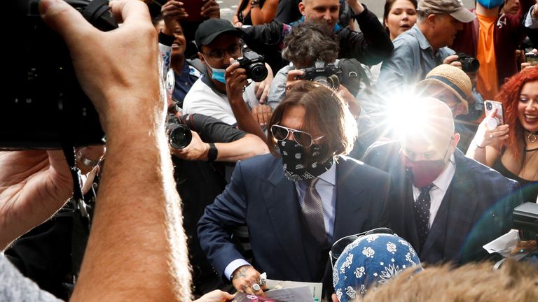 Johnny Depp arrives at the High Court a little later than usual on 17 July
