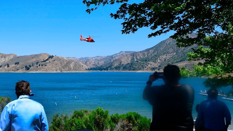 A helicopter searches over Lake Piru in Ventura County, California on July 9, 2020 for former Glee actress Naya Rivera