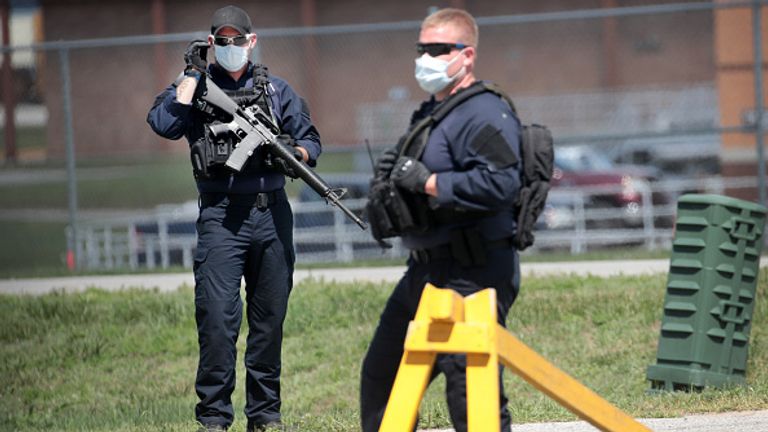 Guards outside the Indiana prison on Monday