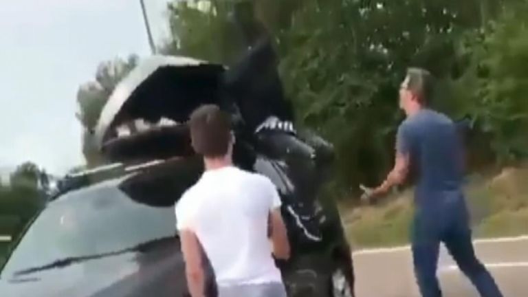 Moment migrants found hiding in car roof box