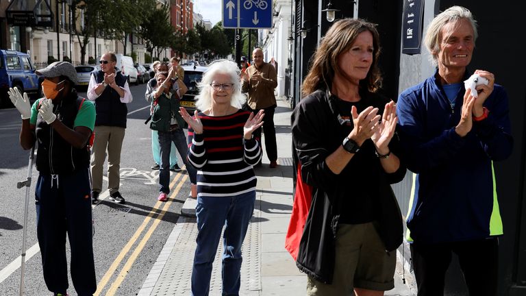 Members of the public applaud outside Chelsea and Westminster Hospital for the 72nd anniversary of the NHS