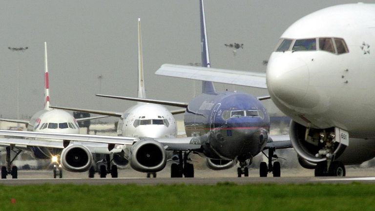 Aircraft queuing for take-off at Heathrow Airport. 
