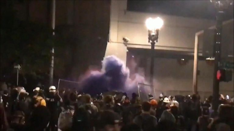 Portland police clash with protesters 