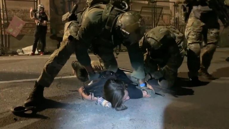 Federal agents restrained Noelle Mandolfo and knelt on her back while detaining her during a protest in Portland, Oregon