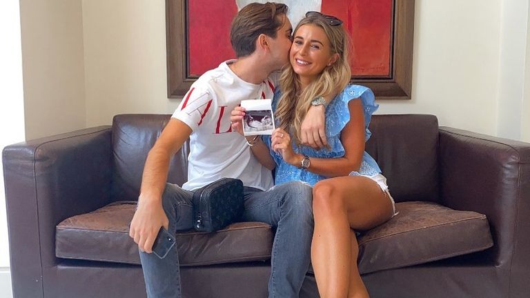 Dani Dyer and her partner Sammy Kimmence posed with an image of the baby scan