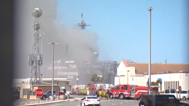 Firefighters battled through thick smoke on the USS Bonhomme Richard in San Diego