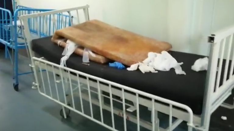 Grime-covered beds also cluttered the corridors in Livingstone Hospital