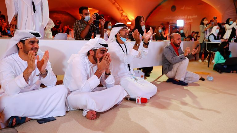 People react as they watch a big screen displaying the launch of the Hope Probe from Tanegashima Island in Japan, at the Mohammed bin Rashid Space Centre in Dubai, United Arab Emirates July 20, 2020