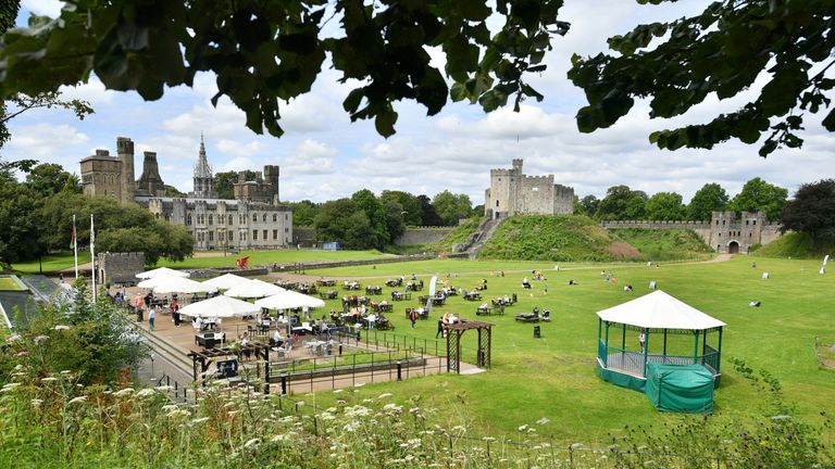 People enjoy the warm weather at Cardiff Castle on Wednesday