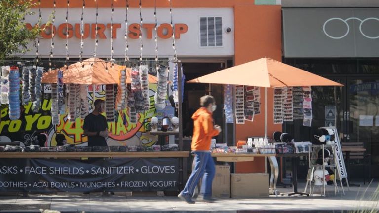 Masks and sanitisers are being sold outside in West Hollywood