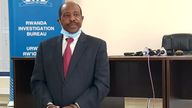 Paul Rusesabagina was paraded in handcuffs before the media at police headquarters