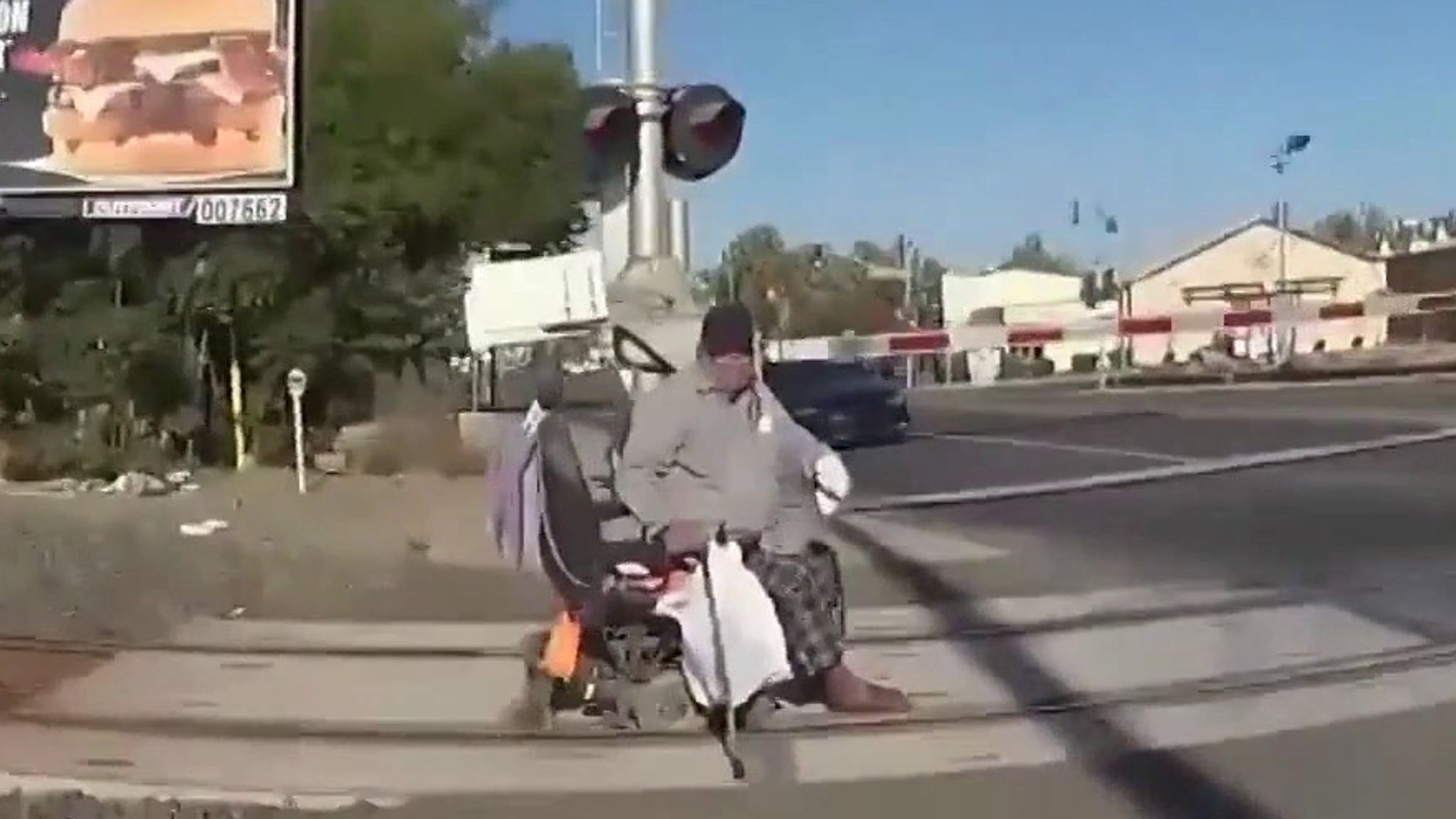 Moment man is saved from oncoming train