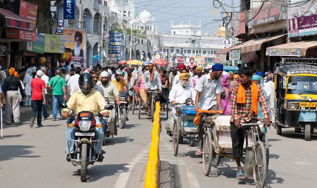 Indian police arrest 25 people after tainted alcohol leaves 69 dead