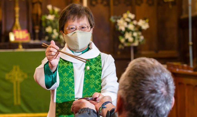 Coronavirus: Vicar uses chopsticks to serve bread in Holy Communion safety measure