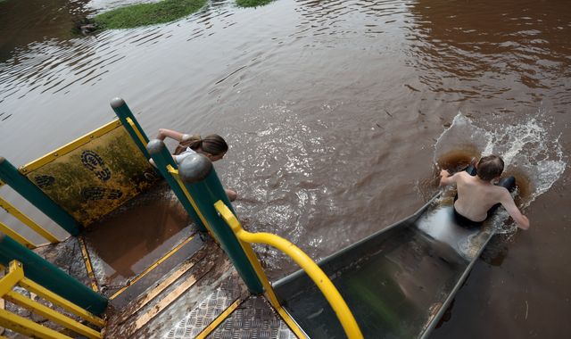 Heavy rain causes flooding and road closures as thunderstorm warning extended