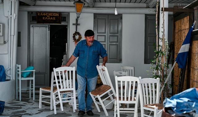 Coronavirus: Greece imposes curfew on bars and restaurants amid spike in COVID cases