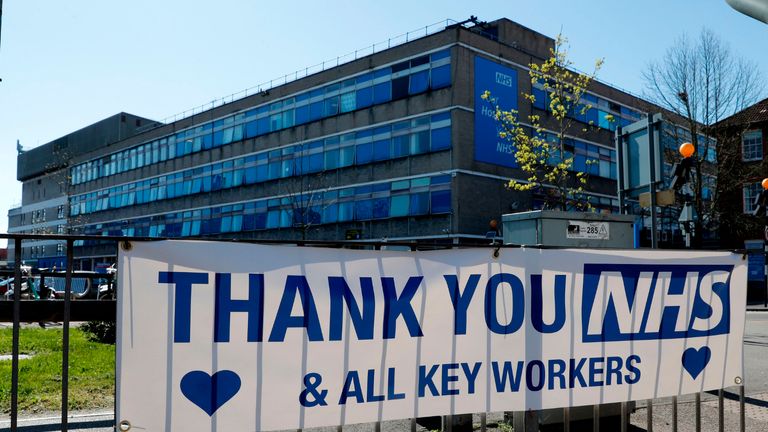 A message of thanks to the NHS (National Health Servce) is pictured attached to railings outside Watford General Hospital in north west London on April 5, 2020, as life in Britain continues during the nationwide lockdown to combat the novel coronavirus pandemic. - Watford General hospital declared a critical incident on Saturday, telling people not to attend after an issue with their oxygen supplies. On Sunday reports confirmed that John Alagos, a 23-year-old nurse who treated coronavirus patients at the hospital, died after a shift on Friday. (Photo by Adrian DENNIS / AFP) (Photo by ADRIAN DENNIS/AFP via Getty Images)