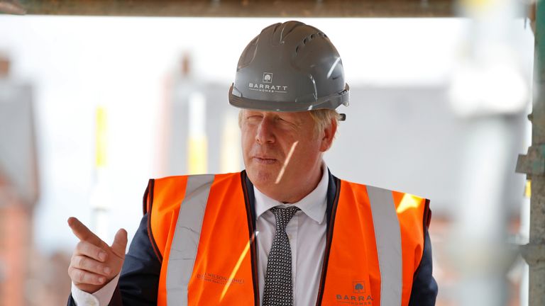 Prime Minister Boris Johnson during a visit to a construction site in Cheshire.