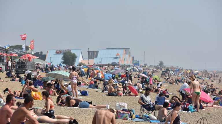 SOUTHEND-ON-SEA, ENGLAND AUGUST 11: People sunbathe on the beach during the recent hot weather on August 11, 2020 in Southend on Sea, England. Parts of the UK remain in the grip of a Summer heatwave that has seen temperatures rise above 30 degrees in much of the country. (Photo by John Keeble/Getty Images)