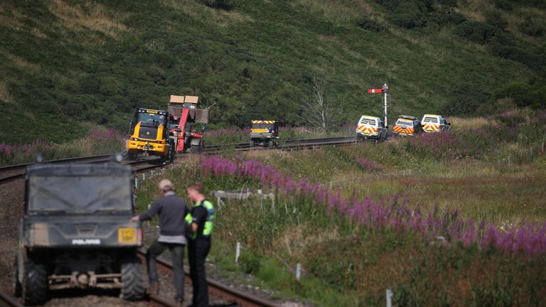 Emergency vehicles at Carmont crossing, where they are accessing the train line from the road, south of the scene in Stonehaven, Aberdeenshire, where the 06.38 Aberdeen to Stonehaven ScotRail train derailed at about 9.40am this morning. The fire service, police and ambulance service are in attendance and the incident is ongoing.