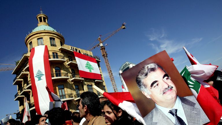 BEIRUT, LEBANON - FEBRUARY 14:  Hundreds of thousands of Lebanese turn out to mourn the one year anniversary of the assassination of former Lebanese Prime Minister Rafiq Hariri, displayed on a placard, February 14, 2006 in Beirut, Lebanon. Hariri's murder is widely blamed on Syrian elements. Outrage of the assassination led to massive demonstrations in the streets of Beirut a year ago that forced the Syrian regime to pull its forces out of the country after 29 years occupation.  (Photo by Ghaith Abdul-Ahad/Getty Images)