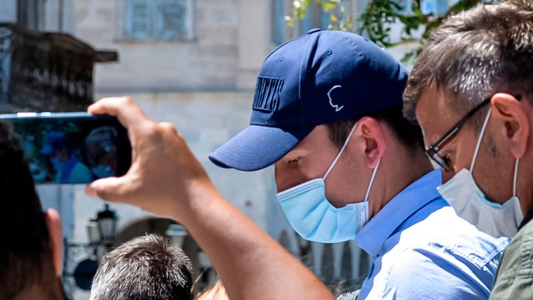 Manchester United football team captain Harry Maguire leaves a courthouse on the Greek island of Syros, the administrative hub of the Cycladic island group that includes Mykonos on August 22, 2020. - Maguire was released from Greek police custody on August 22, 2020, TV footage showed, pending a hearing on assault charges on the neighbouring island of Mykonos. The £80 million (88 million euros) defender was arrested late on August 20, after what Greek police described as an "altercation" between two groups of British tourists on Mykonos. (Photo by EUROKINISSI / AFP) (Photo by EUROKINISSI/AFP via Getty Images)