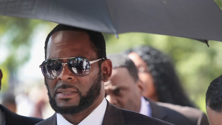 CHICAGO, ILLINOIS - JUNE 26: R&B singer R. Kelly leaves the Leighton Criminal Courts Building following a hearing on June 26, 2019 in Chicago, Illinois. Prosecutors turned over to Kelly's defense team a DVD that alleges to show Kelly having sex with an underage girl in the 1990s. Kelly has been charged with multiple sex crimes involving four women, three of whom were underage at the time of the alleged encounters. 
 (Photo by Scott Olson/Getty Images)