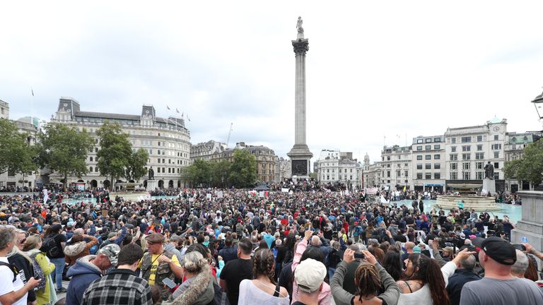 Anti-lockdown protesters, who believe that the coronavirus pandemic is a hoax, gather at the 'Unite For Freedom' rally in Trafalgar Square, London.