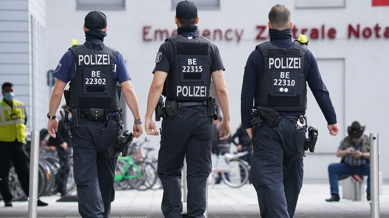 Police officers outside Charite university hospital in Berlin where Russian opposition politician Alexei Navalny is being treated